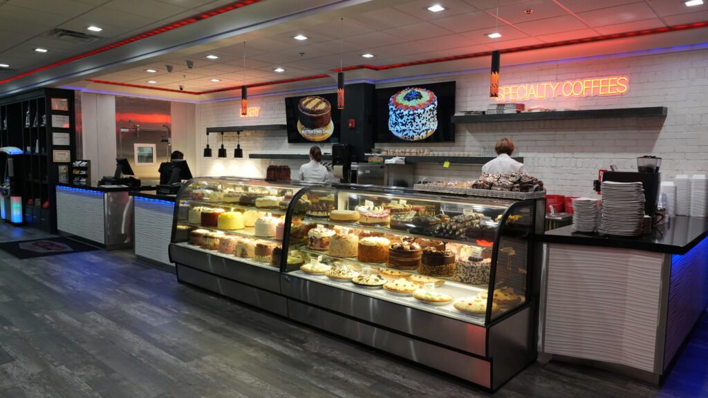 Inside City Café Diner showcasing a dessert display filled with cakes and pastries, a highlight of this downtown Chattanooga restaurant.